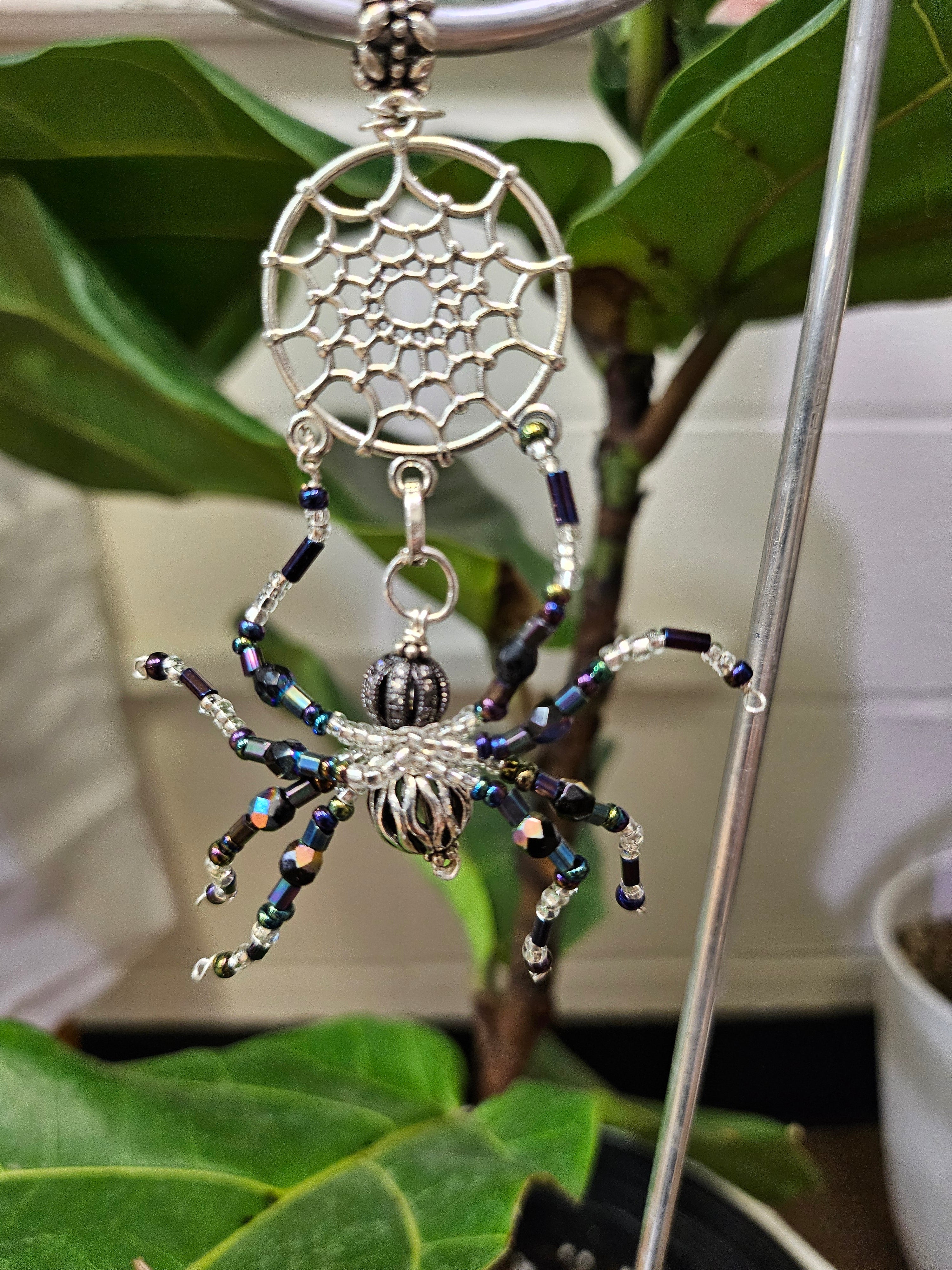 Add a touch of handcrafted magic to your plant collection with this Handmade Beaded Metal Houseplant Stake. Whether adorning a sunny windowsill, enhancing your indoor jungle, or sprucing up a patio garden, this stake offers a charming way to celebrate nature&