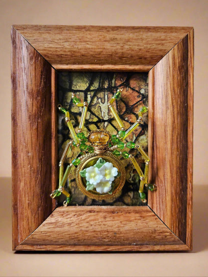 Jeweled Insect and Creature Art in Small Frame by KStonely (Kathy Epperley) is a celebration of nature’s elegance and meticulous craftsmanship. This 3D artwork captures the essence of KStonely’s artistry, merging intricate beadwork with an ethereal, whimsical touch.