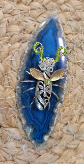 Discover KStonely’s Jeweled Insect and Creature Art on Semi-Precious Stone, featuring stunning 3D beaded sculptures. Crafted with glass crystals, agate, pearls, and fine beads on semi-precious stone. Each piece celebrates nature’s beauty. Perfect as decor or gifts.