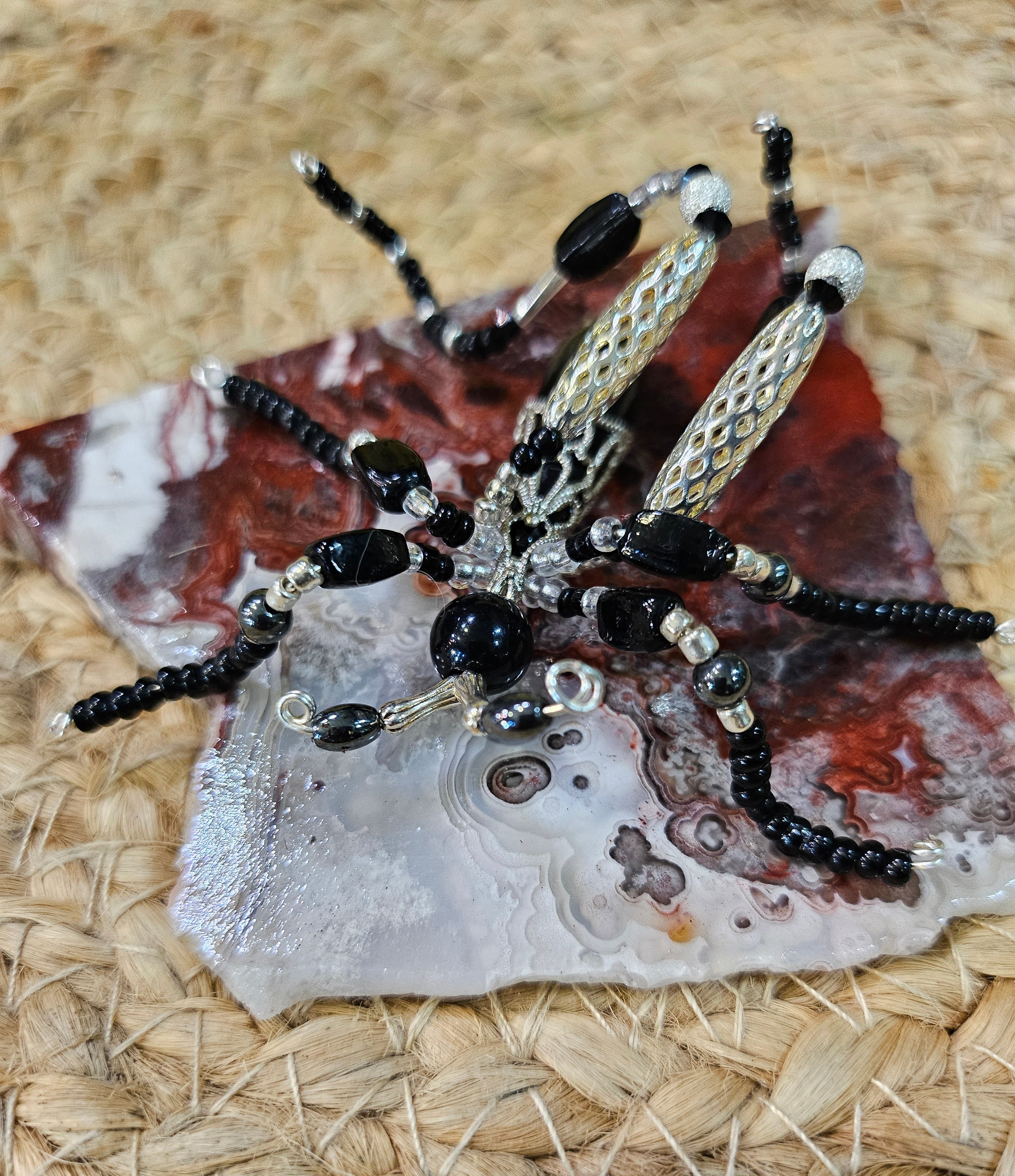 Discover KStonely’s Jeweled Insect and Creature Art on Semi-Precious Stone, featuring stunning 3D beaded sculptures. Crafted with glass crystals, agate, pearls, and fine beads on semi-precious stone. Each piece celebrates nature’s beauty. Perfect as decor or gifts.