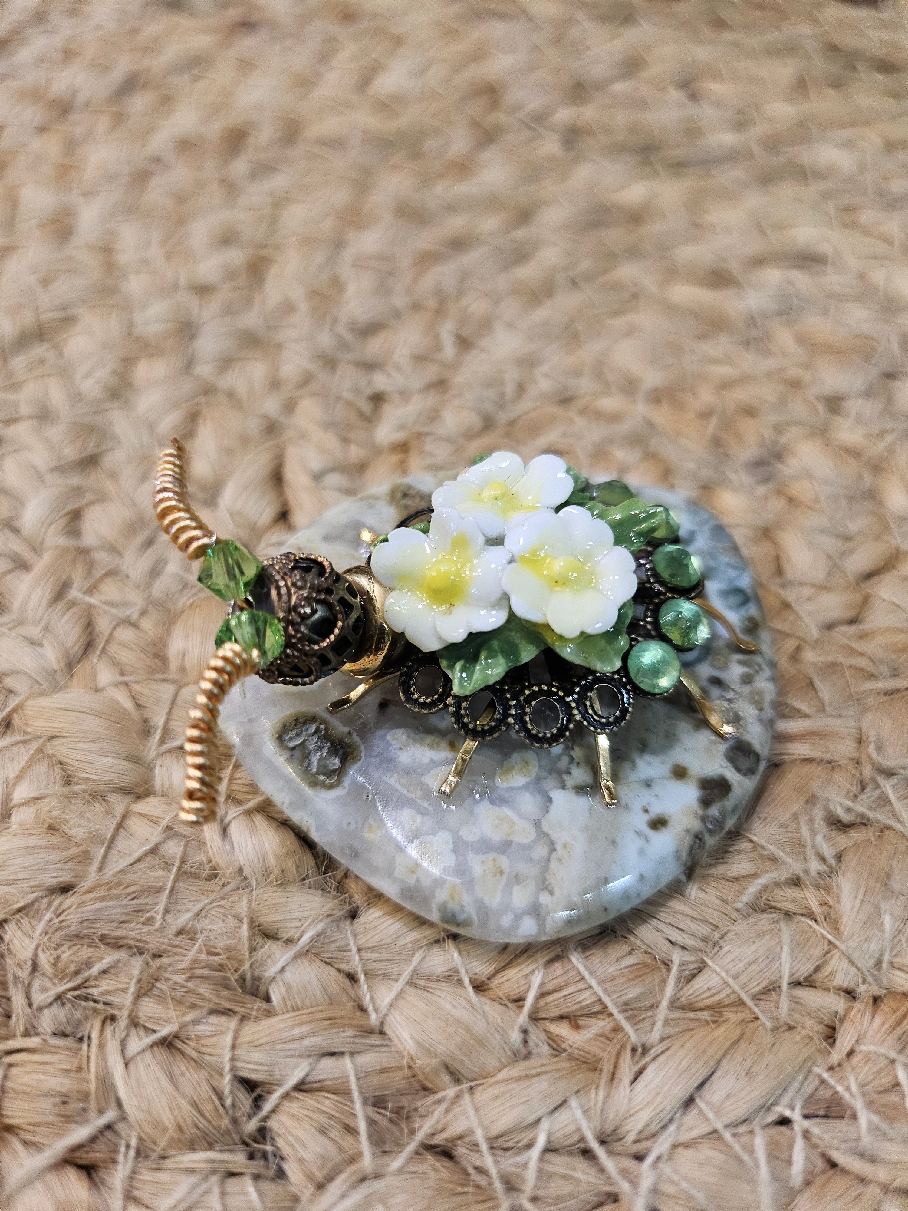 Discover KStonely’s Jeweled Insect and Creature Art on Semi-Precious Stone, featuring stunning 3D beaded sculptures. Crafted with glass crystals, agate, pearls, and fine beads on semi-precious stone. Each piece celebrates nature’s beauty. Perfect as decor or gifts.